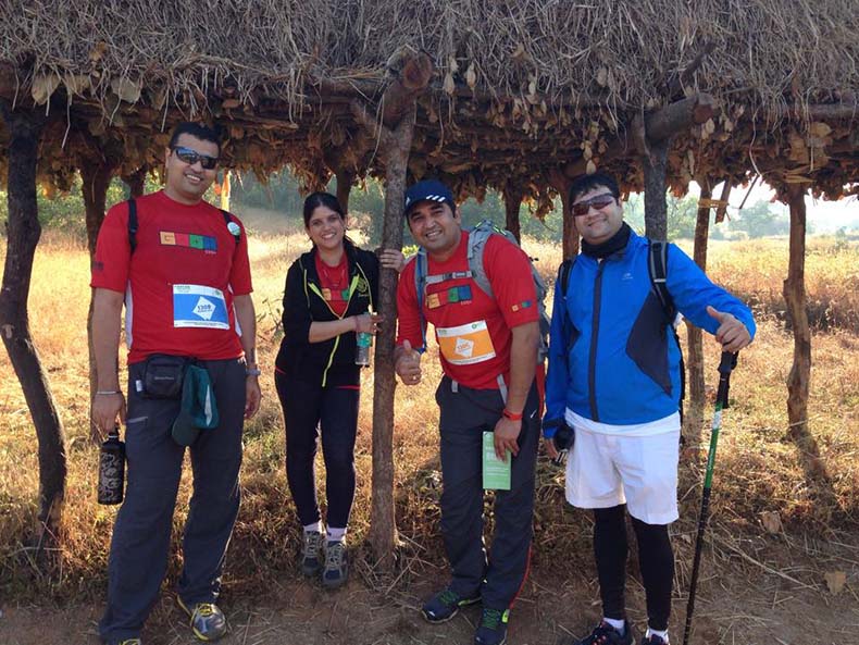 What a  feeling :  Manish in blue  relaxing with his 100 km oxfam trail walk team.