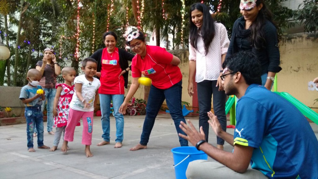 GOQii employees enjoying with the kids at Access Life