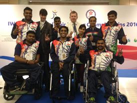Vibhas Sen seated in the Centre with his India team